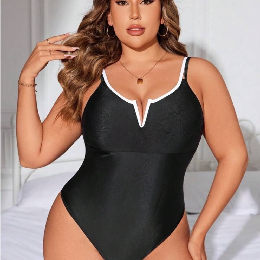 Elegant Black One-Piece Swimsuit, NWOT, Sold Out Style